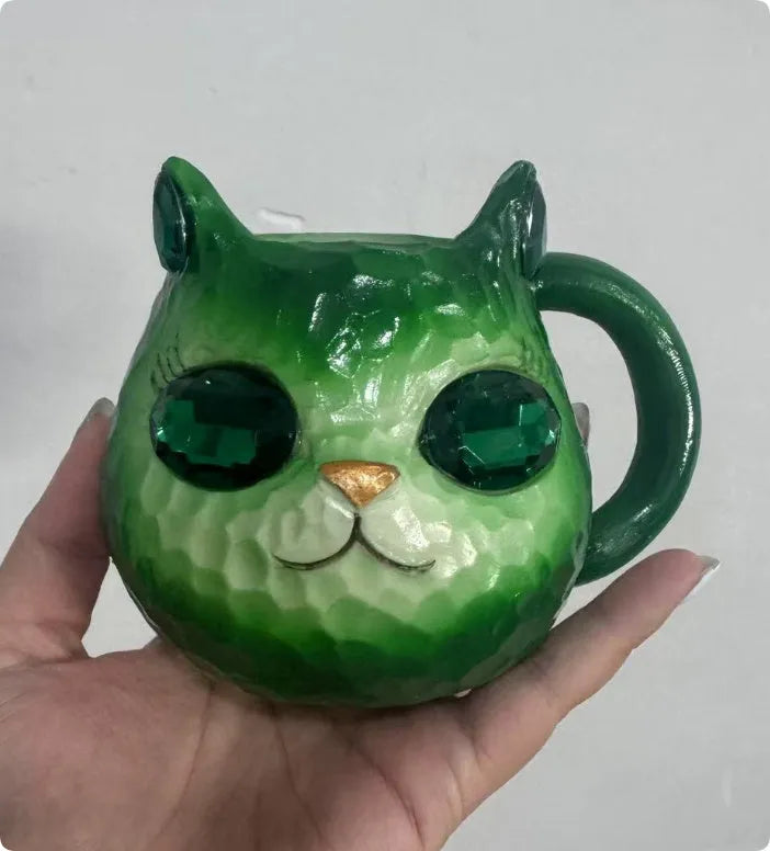 Resin crystal earth cat cup craft ornament in blue, green, pink or purple for promotional gifting.