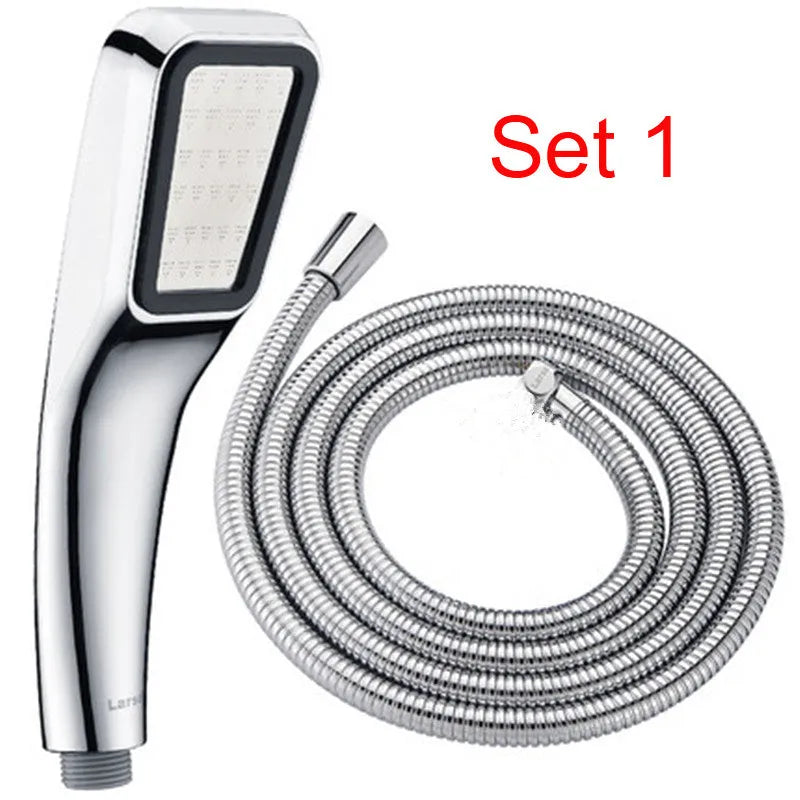 Orange hand-held pressurised shower with 60mm rain spray face