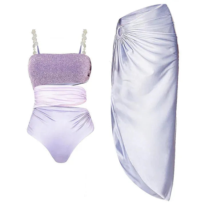 Purple one-piece swimsuit with hollow design and matching wrap skirt set for women seaside vacation wear
