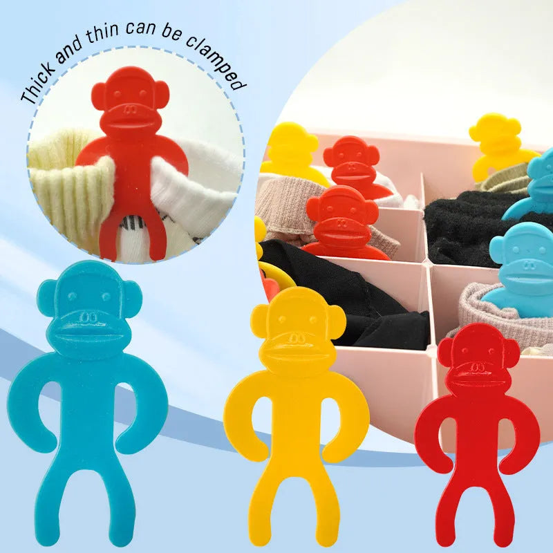 Plastic socks storage clips in blue, red, and yellow colours for machine washing