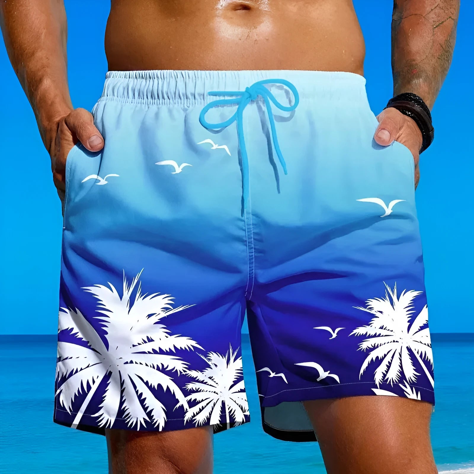 Men's loose fit ethnic style swimming trunks in polyester fibre fabric, shown in colour J001.