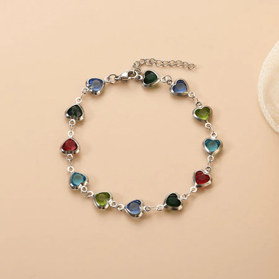 A stainless steel geometric heart bracelet with a Devil's Eye design in one of six electroplated colour options.