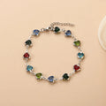 A stainless steel geometric heart bracelet with a Devil's Eye design in one of six electroplated colour options.