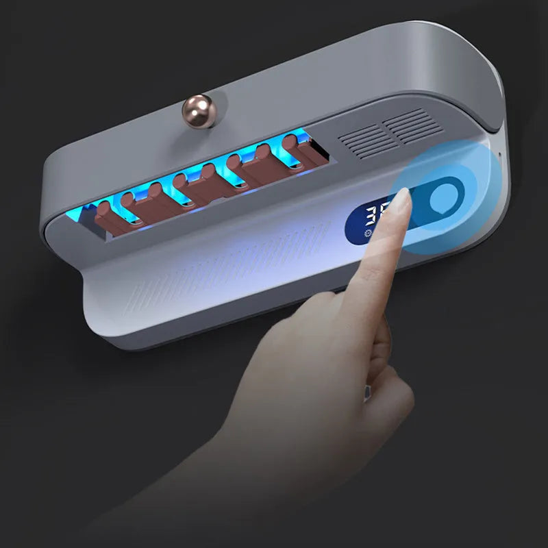 White wall-mounted UV toothbrush steriliser with USB charging port