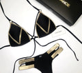 Women's bronzing bikini swimsuit with removable padding, shown in various colours including leopard print.