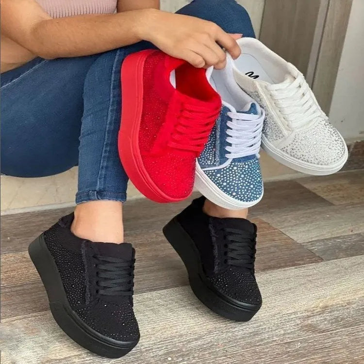 Plus size women's black lace-up casual shoes with rhinestones on the side and a thick rubber sole.