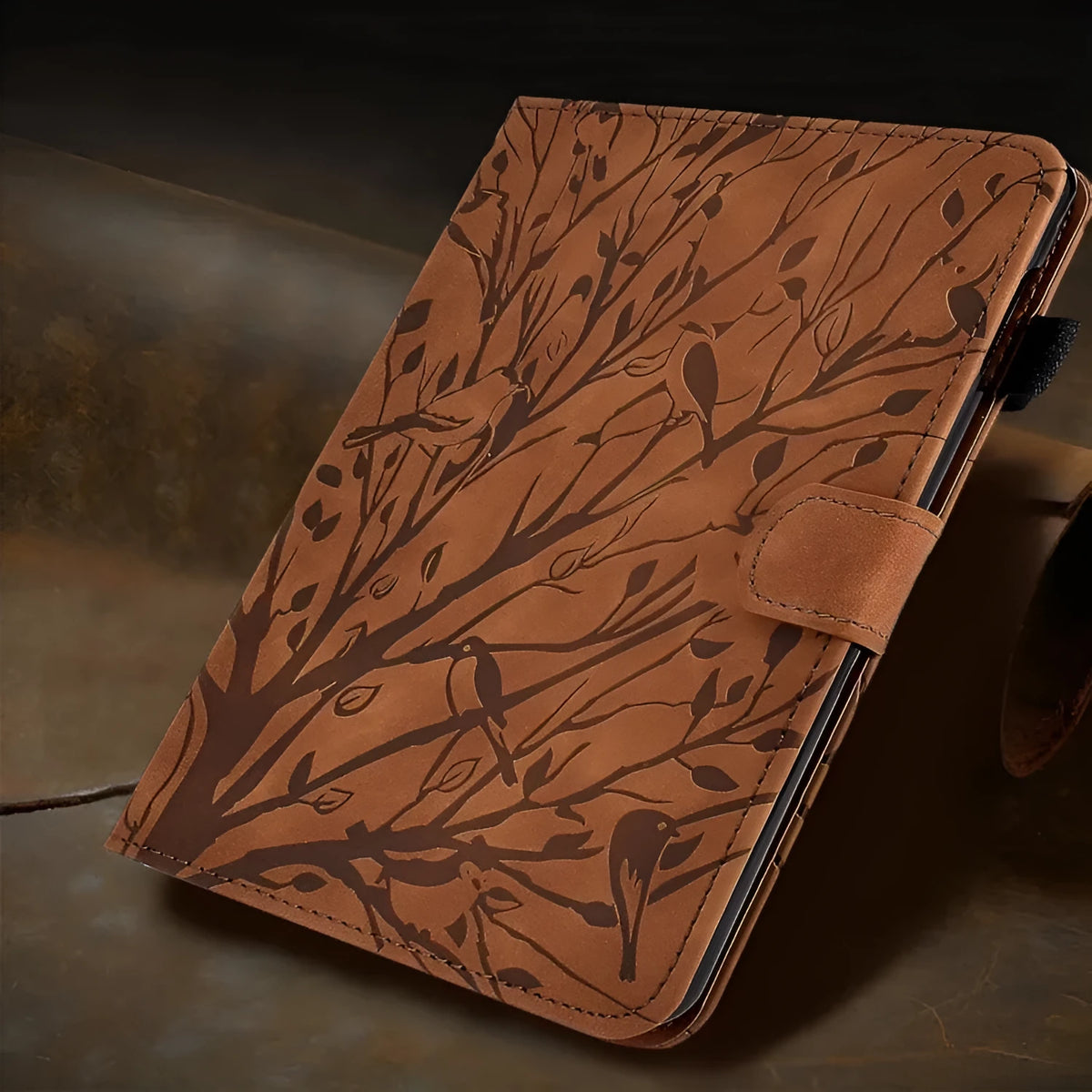 Imitation leather tablet case in black with a folded-out bracket stand.