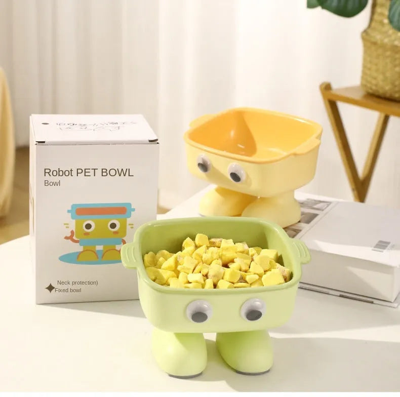 Robot-shaped elevated cat bowl with 15-degree tilt and detachable inner bowl