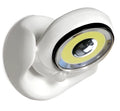 White Atomic Angel induction light unit on a surface, showing its compact 13.3cm by 9.8cm by 15.8cm dimensions.
