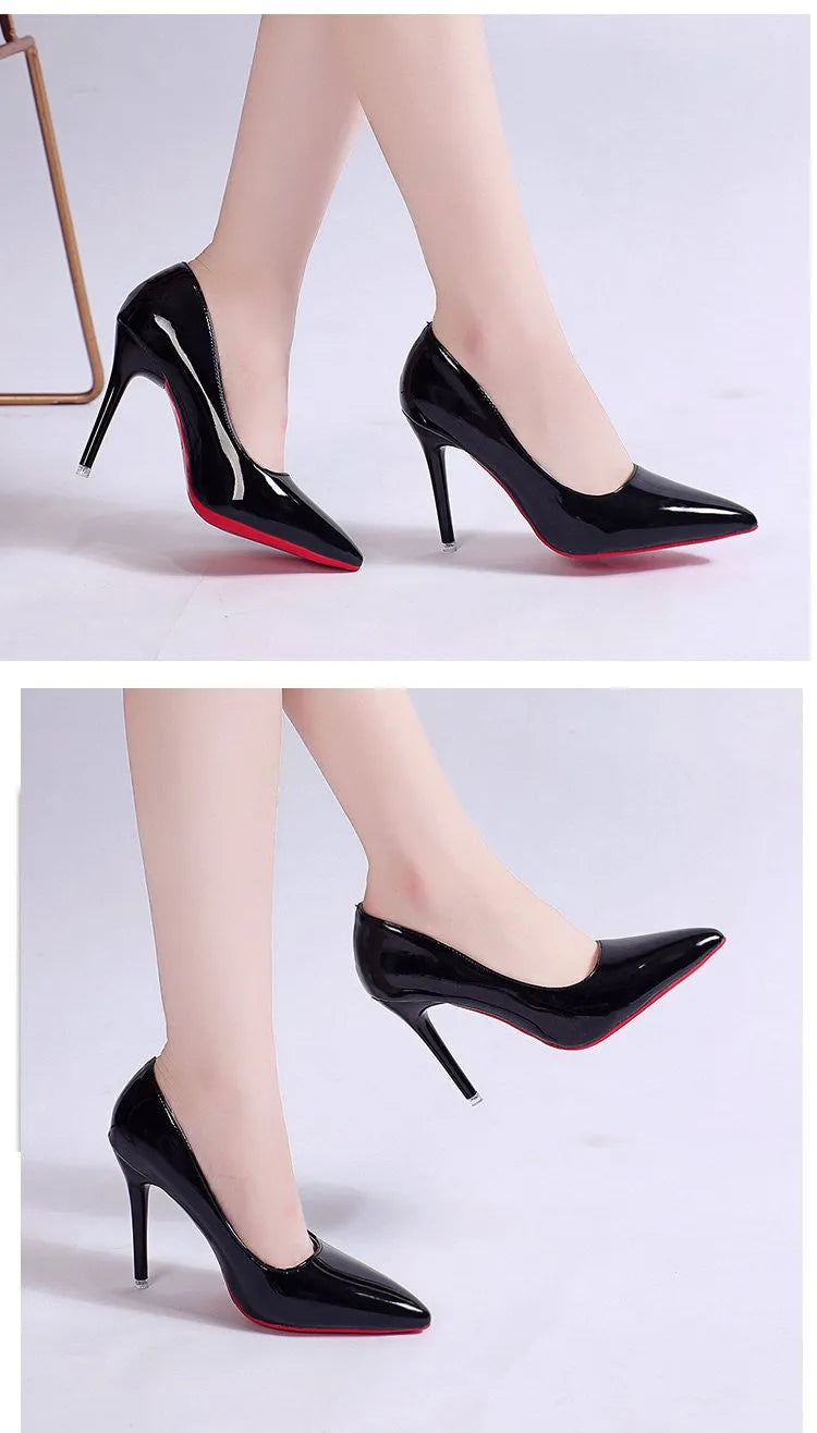 Women's black stiletto heel pointed toe pump shoe on a white background.