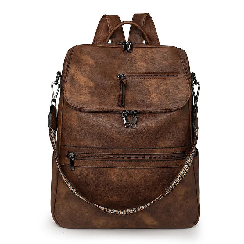 Retro solid colour college backpack with curved shoulder straps, shown in a choice of colours.