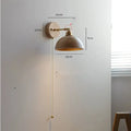 Nordic-style wooden wall mounted bedside lamp with a neutral design.