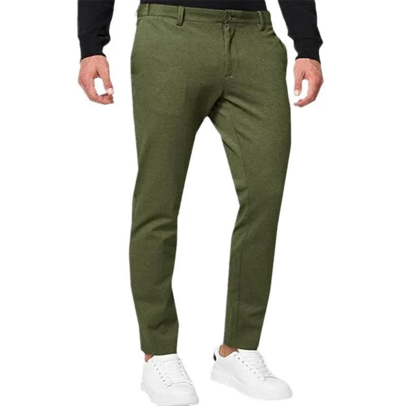 Men's slim-fit tapered chino trousers in a grey colour, showing the casual fit and style.