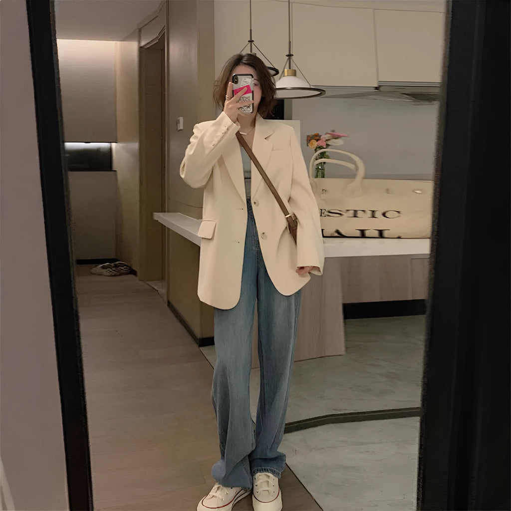 Korean style solid colour polyester blazer on a hanger, showing long sleeves and a chest pocket.