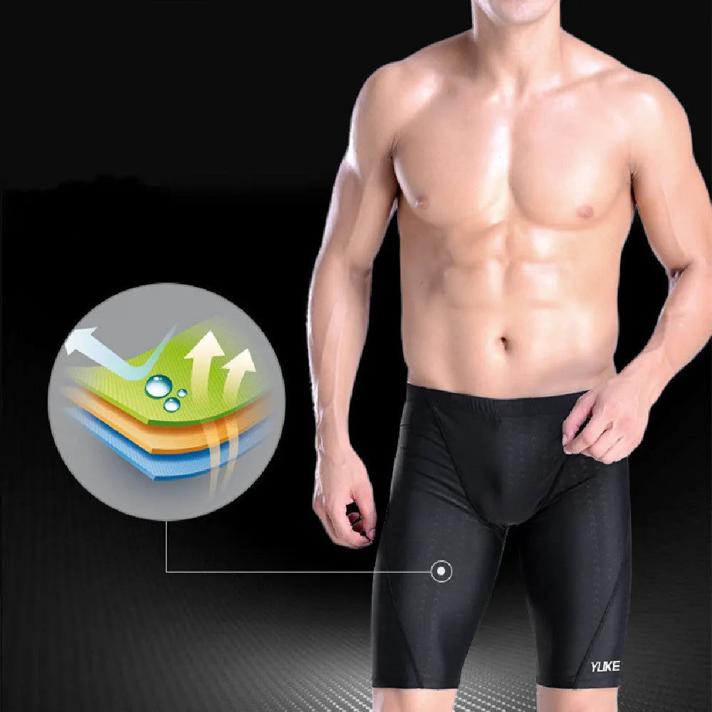 Men's black swimming set with polyester trunks, anti-fog goggles, waterproof cap and accessories