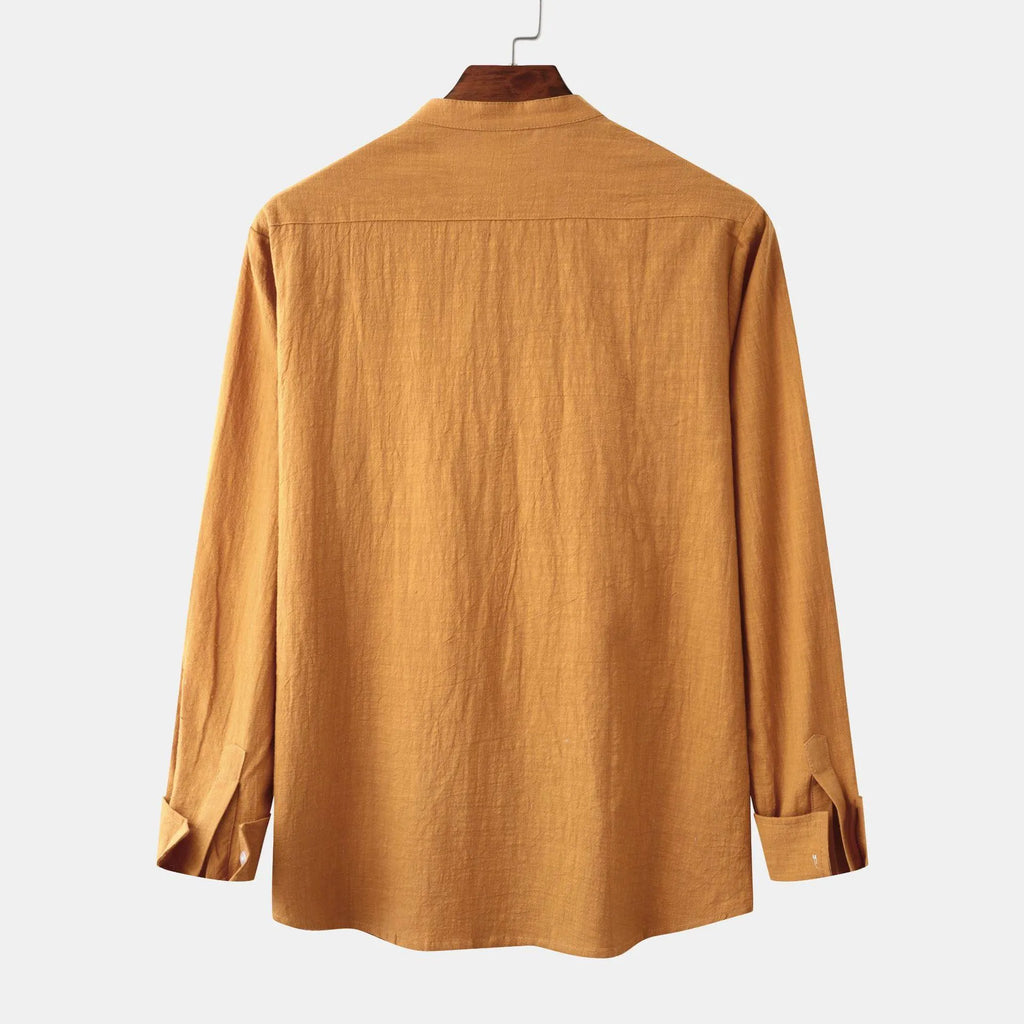 Men's brown slim fit long sleeve cotton blend shirt laid flat.
