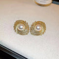 Vintage pearl flower earrings with irregular design and electroplated alloy construction