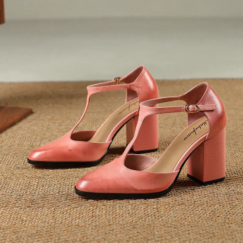 Baotou hollow-cut retro Mary Jane shoes in dark brown with pointed toe and buckle fastening.
