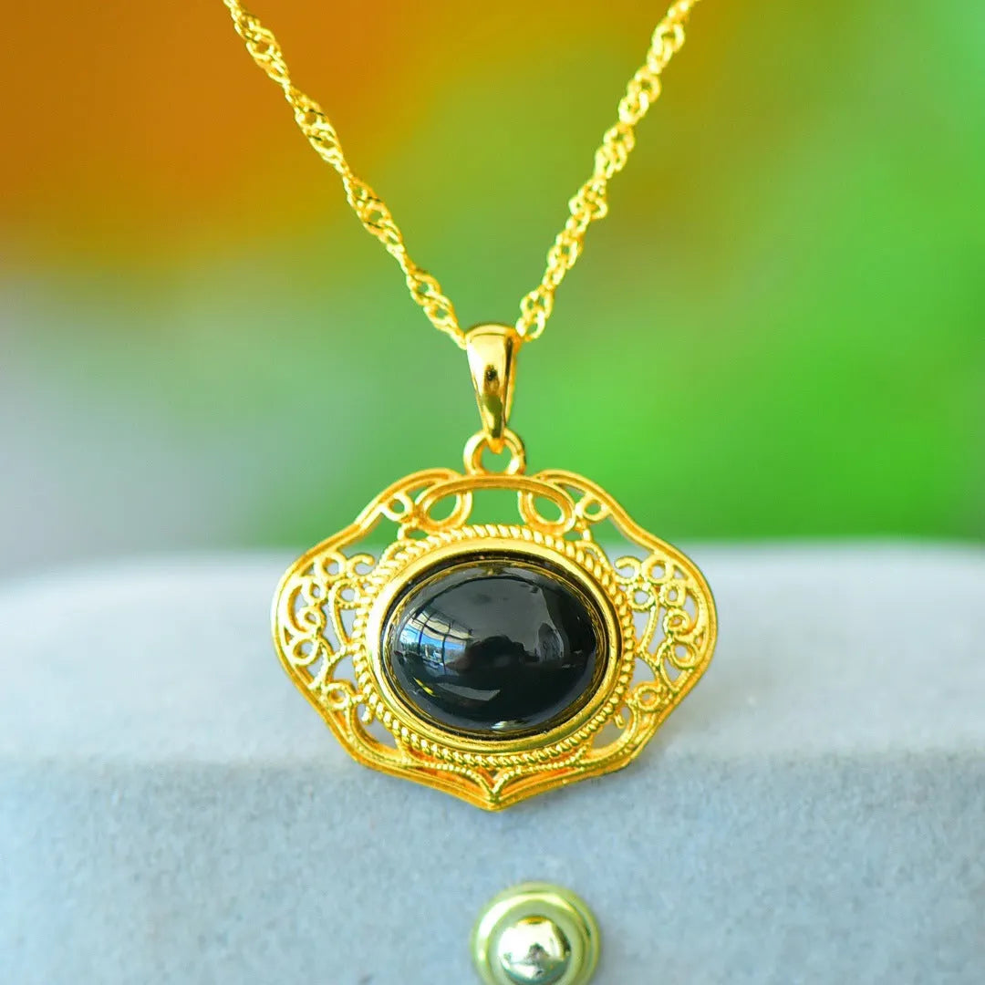 Modern natural Hetian grey jade pendant with copper inlay and ink-blue jade accents on a necklace chain.