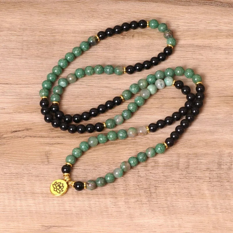 Green and black elastic beaded alloy bracelet with natural style design