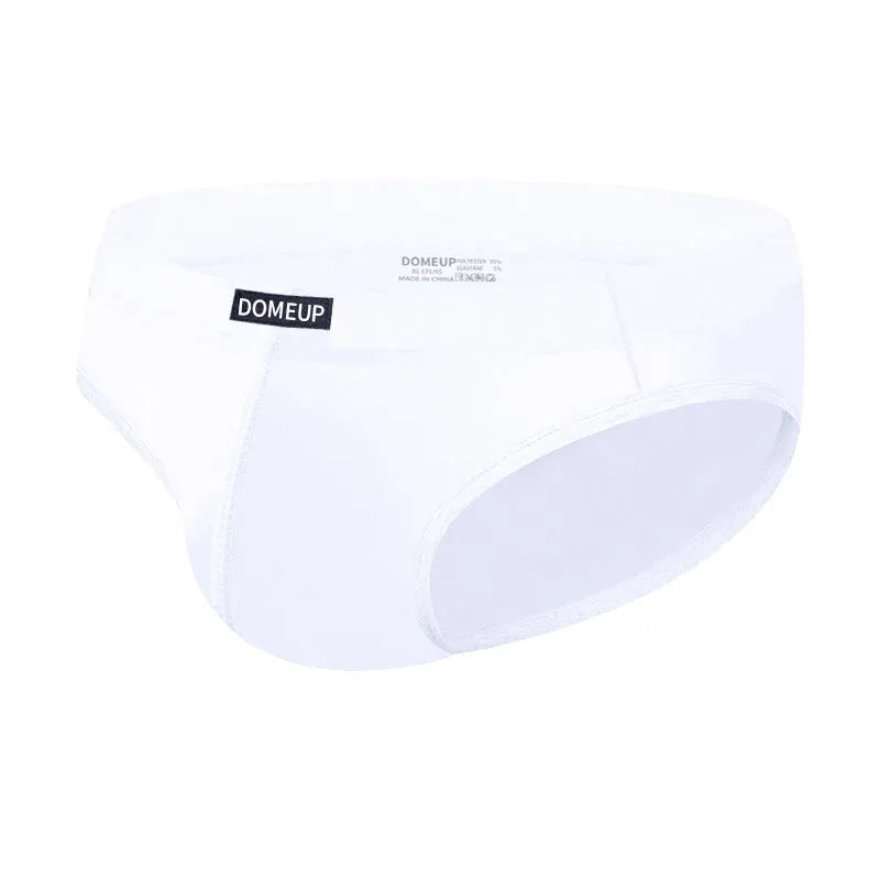 Solid colour men's seamless low waist briefs in black on a white background