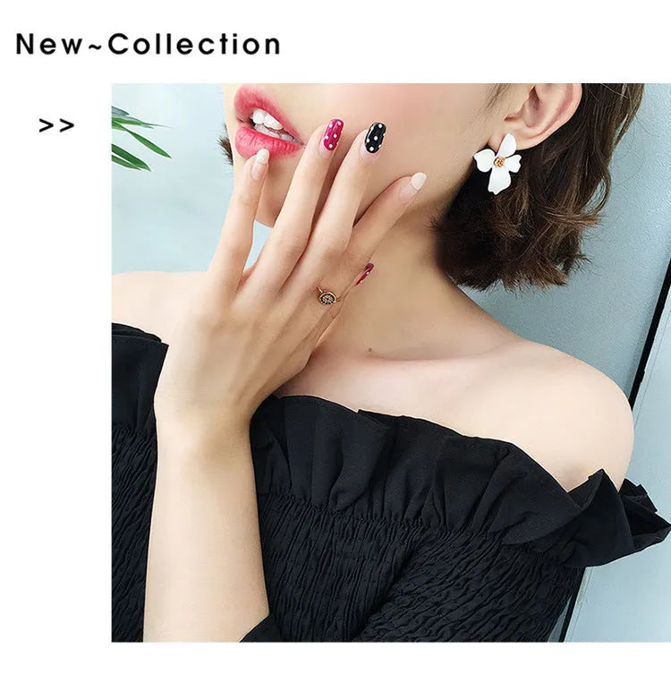 Flower shaped stud earrings for women in pink or white electroplated alloy
