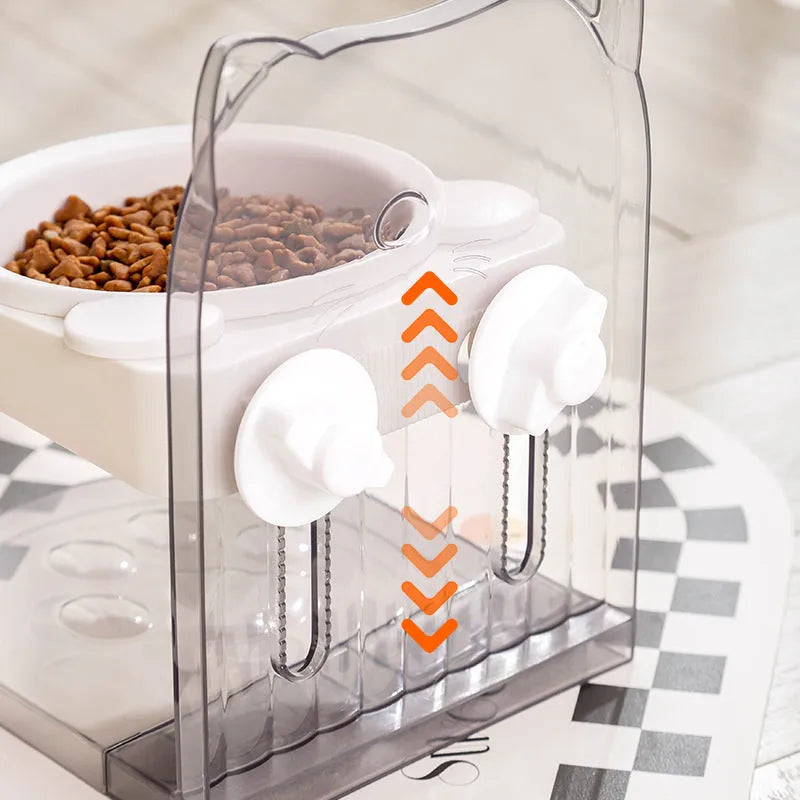 Grey adjustable height cat feeding bowl with cat ears and removable cage on a white background.