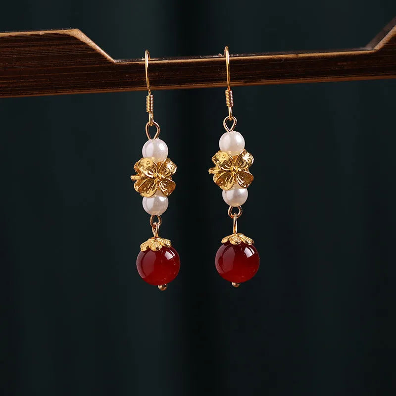 Gold electroplated alloy geometric earrings with vintage Chinese court style design