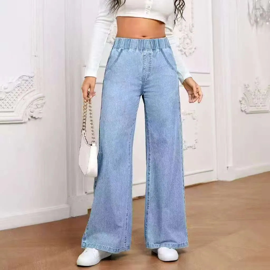 Light blue washed wide-leg denim trousers with straight cut and zip placket fly