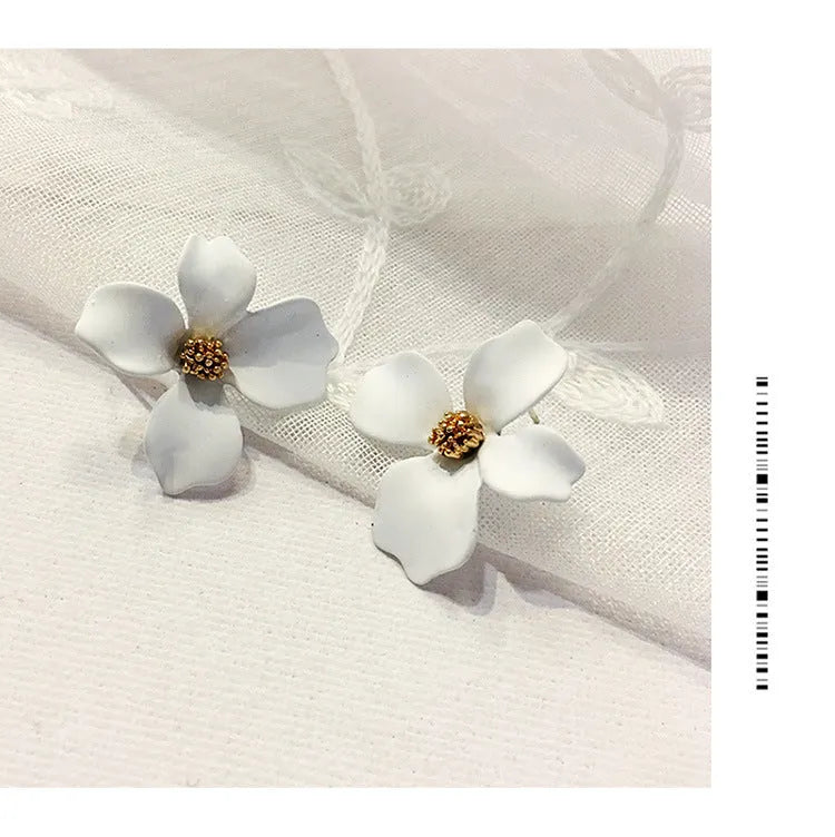 Flower shaped stud earrings for women in pink or white electroplated alloy