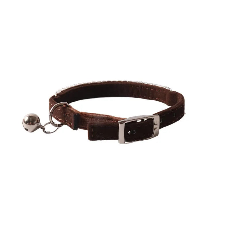 Soft flocking cat collar with an elastic buckle shown in one of six available colours.