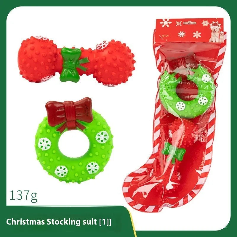 Christmas vinyl dog chew toys gift sets with festive designs including trees, Santa heads, and bite ropes
