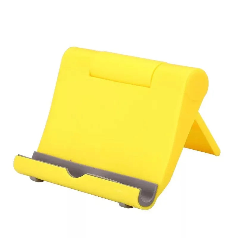 Black PE folding tablet stand holding a mobile phone at an adjustable angle