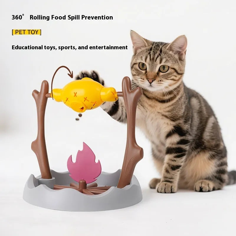 Barbecue-style plastic cat tumbling food feeder toy with multiple openings for treat dispensing