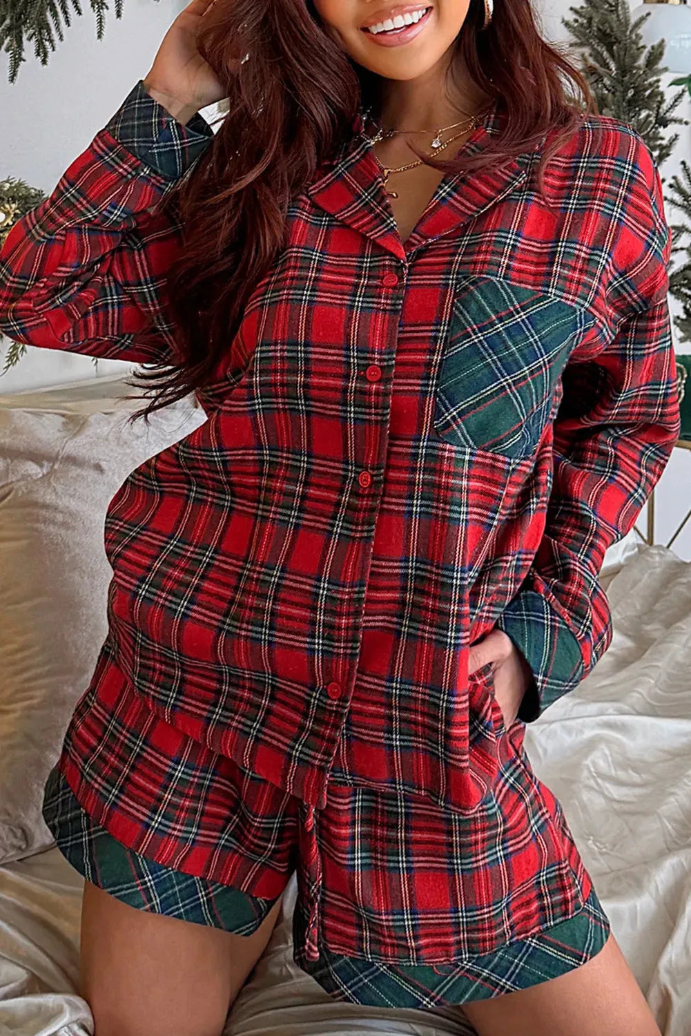 Red plaid Christmas pyjama set with contrast patches, includes long sleeve shirt and shorts