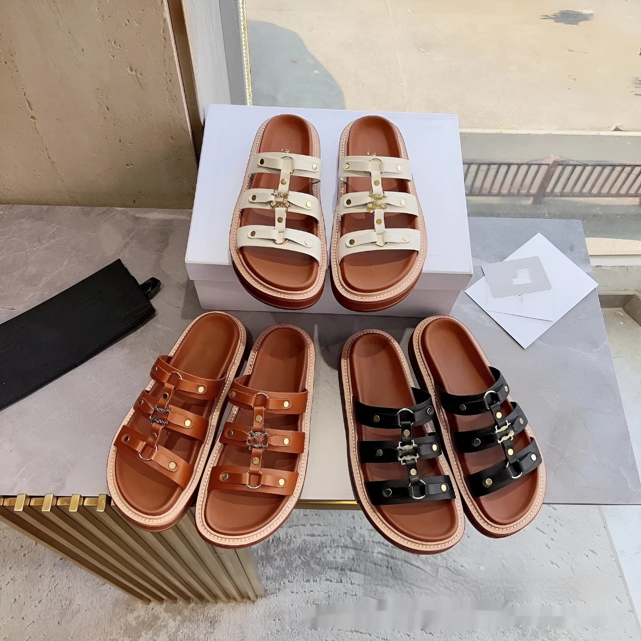 Women's brown patent leather Roman gladiator sandal slippers with crossed straps and sheepskin lining.