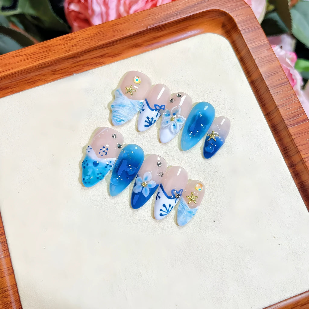 Blue hand-painted carved summer ice transparent plastic fake nails in four sizes