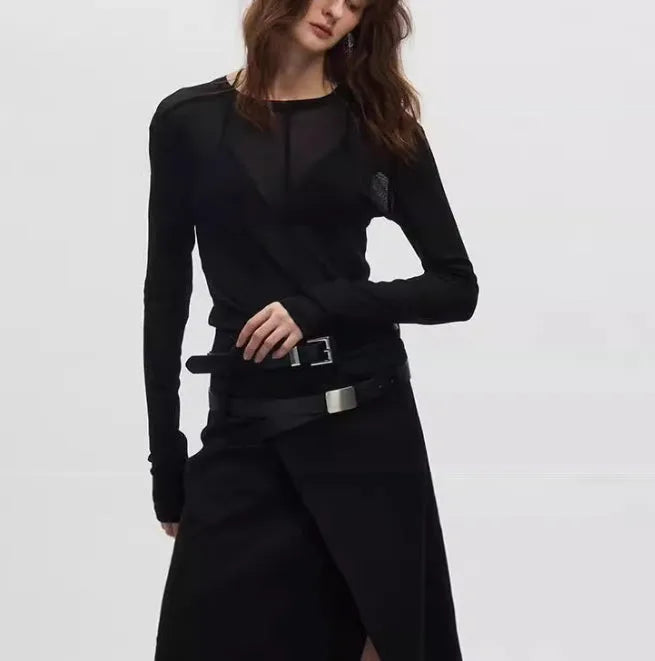 Black slim-fit long sleeve pullover made from ultra-thin see-through PU mesh fabric on a hanger.