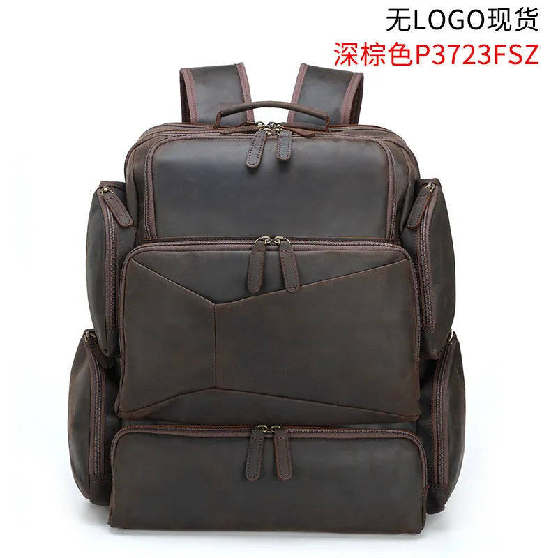 Dark brown genuine leather men's backpack showing 17-inch computer compartment and multiple interior pockets