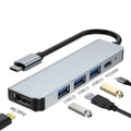 Portable aluminium 6-in-1 USB-C expansion dock for laptops and tablets