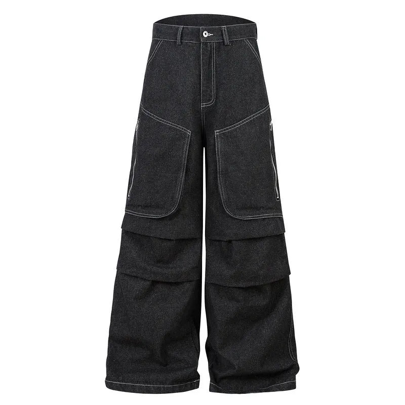 Black pleated mid-waist cotton denim jeans with multi-pocket workwear style on a hanger.