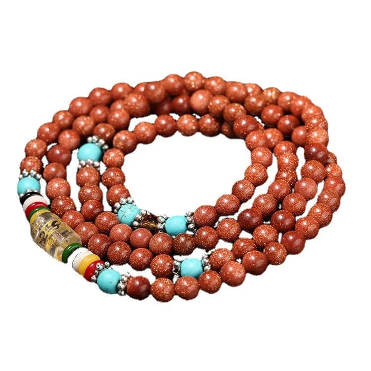 Golden star stone colour bracelet with 108 nugget sand pieces and six words mantra design