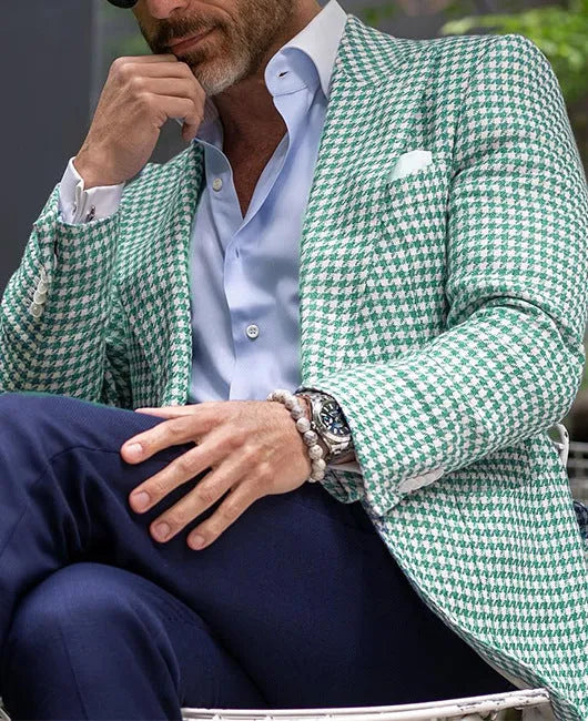 Men's slim-fit two-button suit jacket in a British style with large top-stitch pockets.