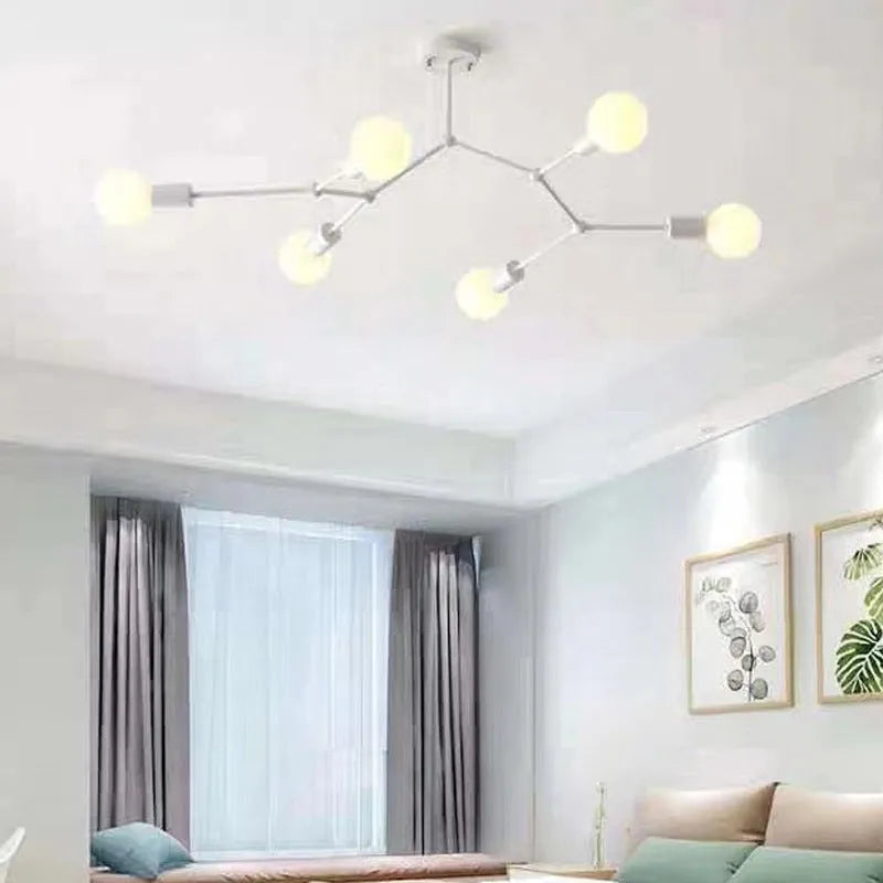 Nordic style iron ceiling chandelier with multiple light arms, in a black finish, mounted on a white ceiling.