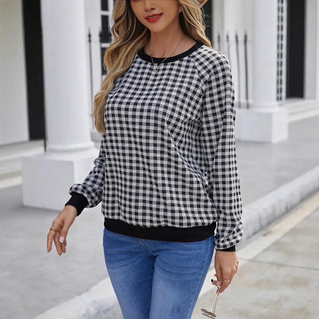 Black long sleeve polyester sweater with striped plaid print pattern