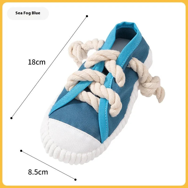 Squeaky plastic dog slipper chew toy in rock yellow, black and sea fog blue colours