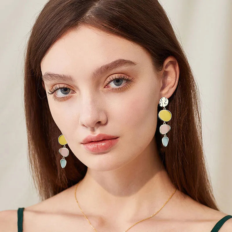 Morandi three-colour oil-dripping disc earrings with sterling silver needle on white background