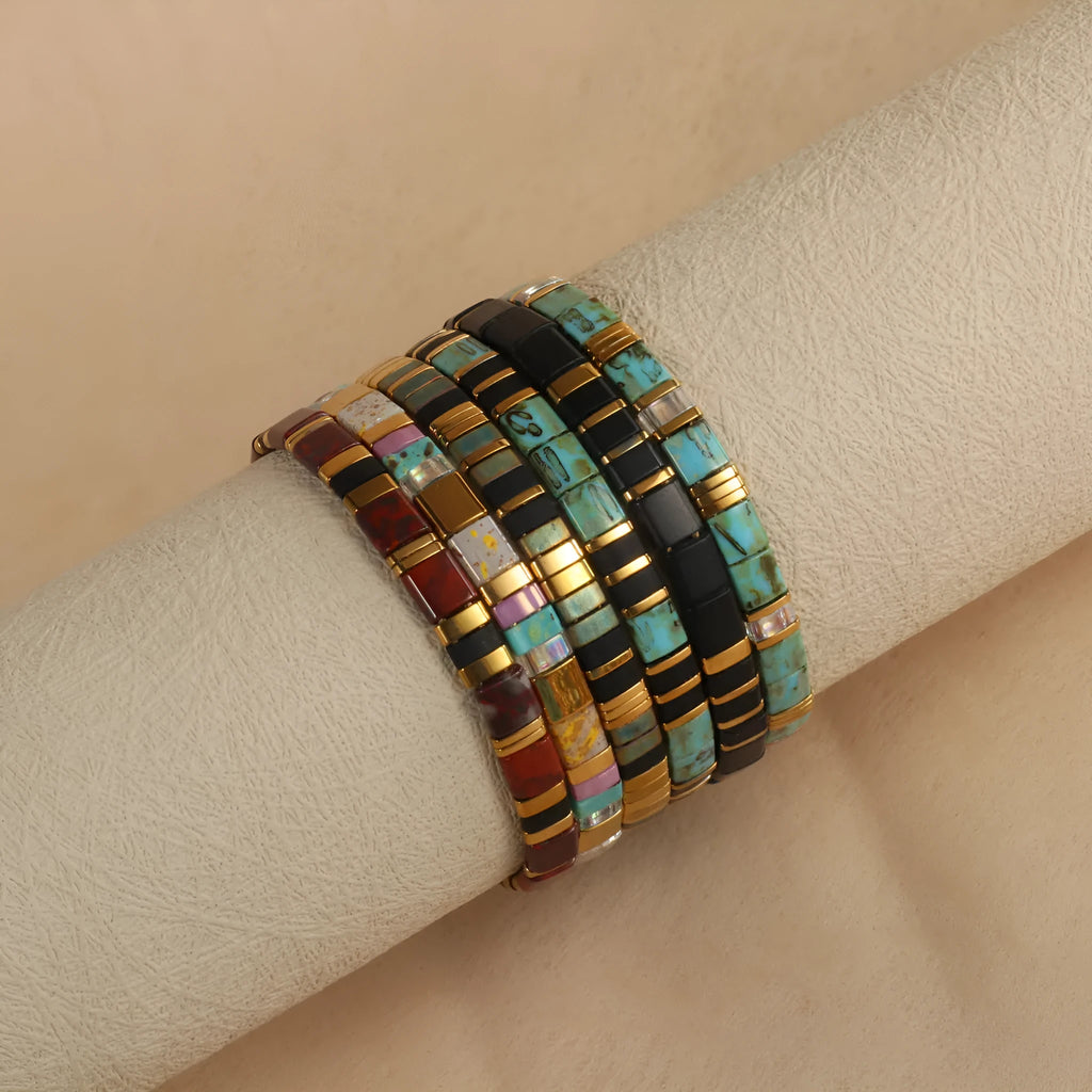 Geometric glass pull bead bracelet in milky white, black, green, blue or red with round decorative elements