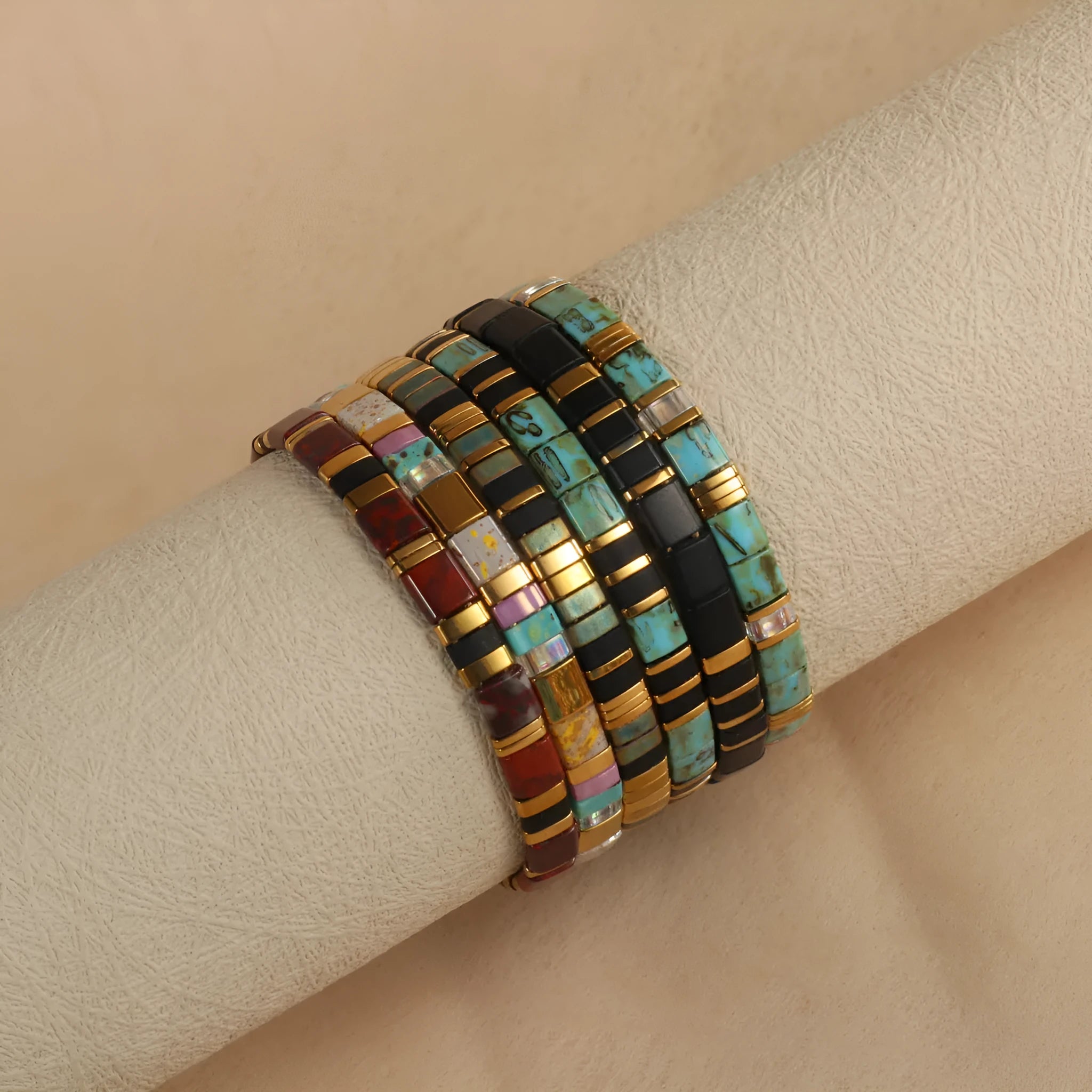 Geometric glass pull bead bracelet in milky white, black, green, blue or red with round decorative elements