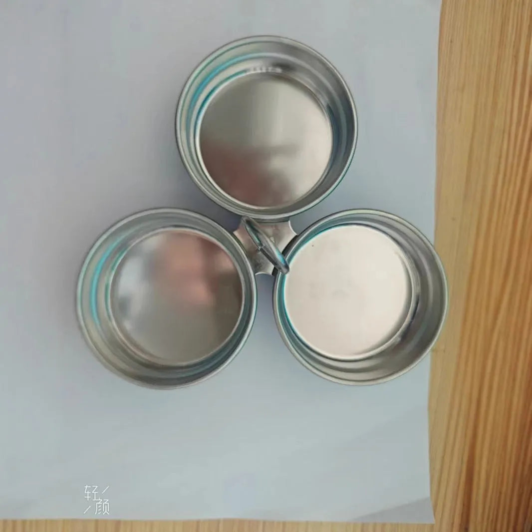 Stainless steel heart-shaped egg steamer with cooking wells for decorative boiled eggs